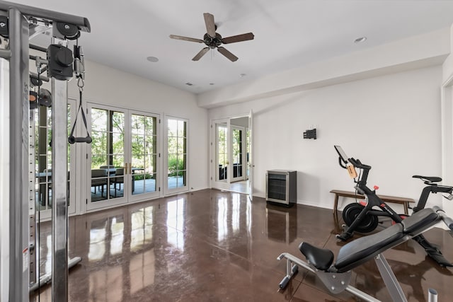 exercise area with french doors and ceiling fan