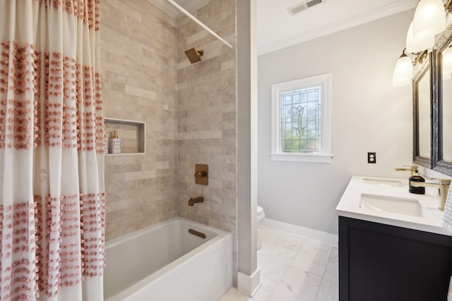 full bathroom with vanity, toilet, crown molding, and shower / tub combo