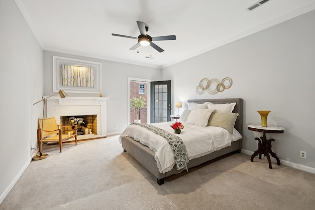 carpeted bedroom featuring ornamental molding, access to exterior, and ceiling fan