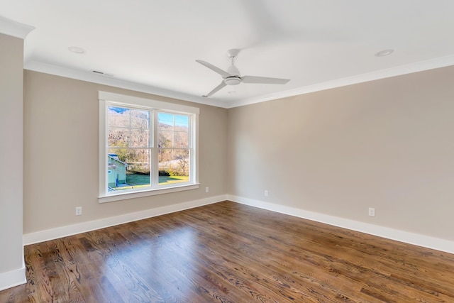 unfurnished room with ceiling fan, ornamental molding, and dark hardwood / wood-style flooring