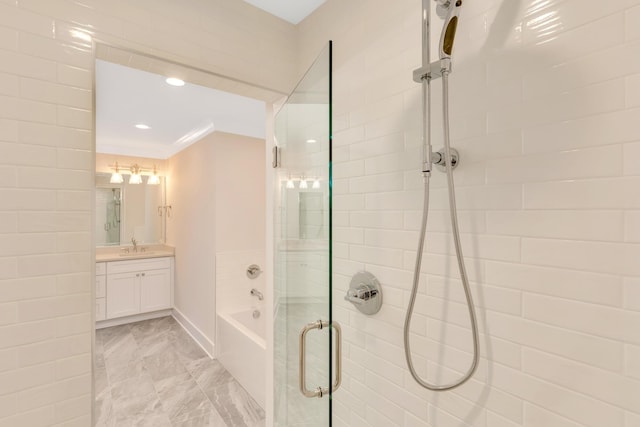 bathroom with vanity, separate shower and tub, and crown molding