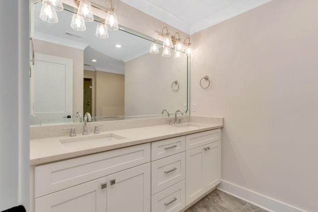 bathroom with vanity and crown molding