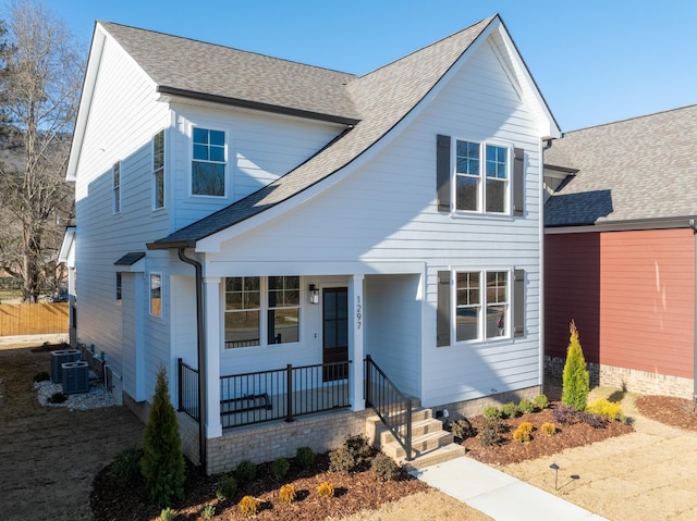 view of front of property featuring central AC and a porch