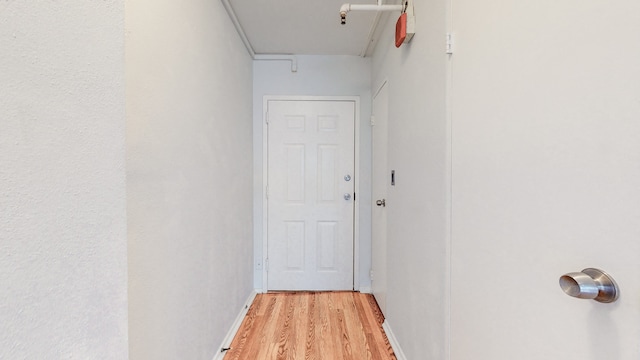 hall featuring light hardwood / wood-style flooring