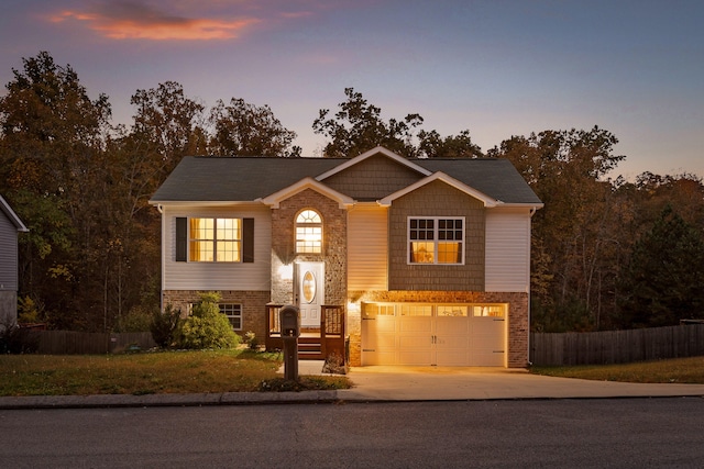 bi-level home featuring a garage