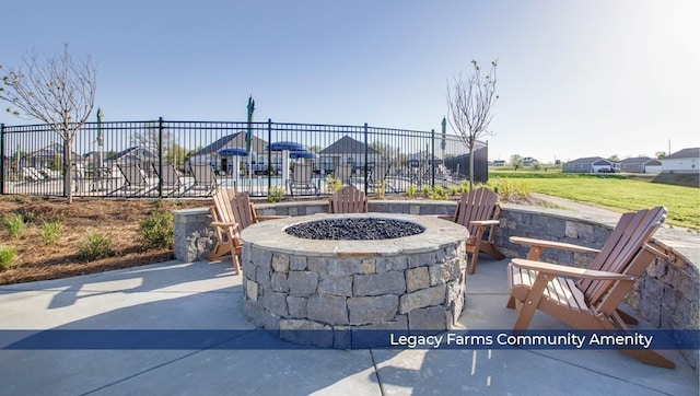 view of patio / terrace with a fire pit