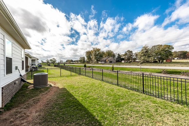 view of yard with central AC