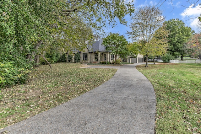 view of front of home with a front lawn