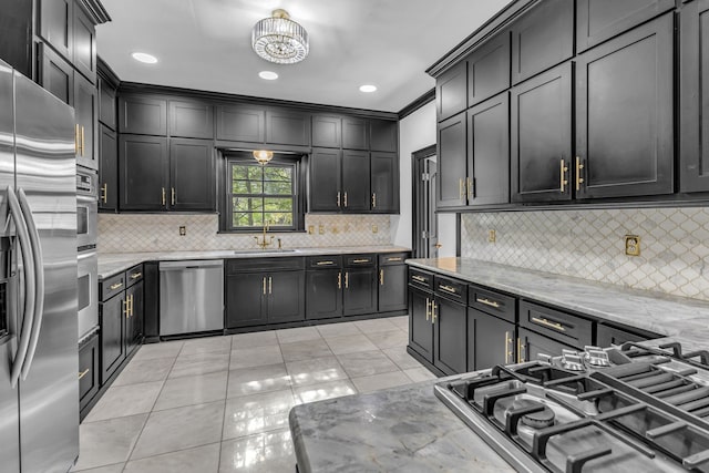 kitchen with decorative backsplash, light stone counters, light tile patterned flooring, and stainless steel appliances