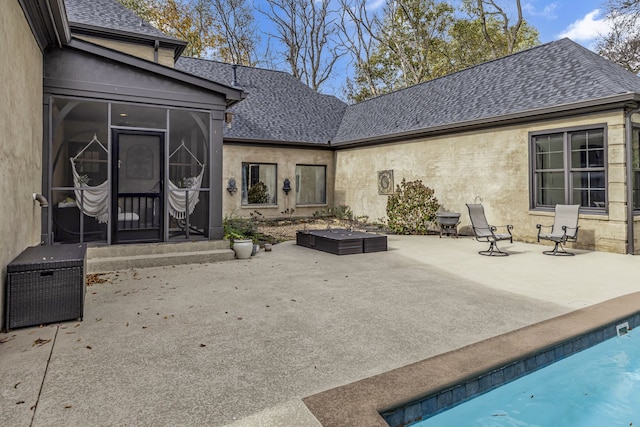 rear view of house with a patio area