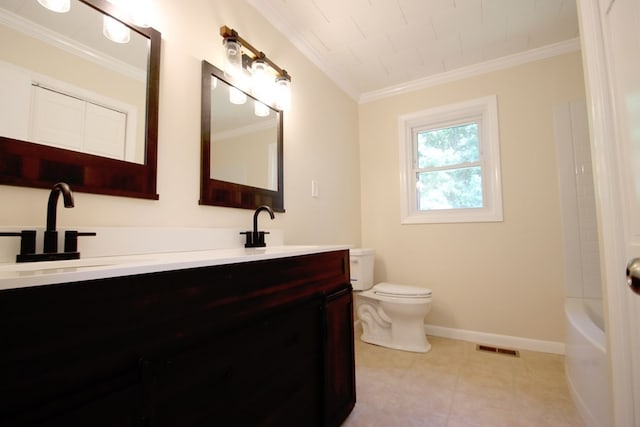 bathroom featuring tile patterned floors, vanity, toilet, and crown molding