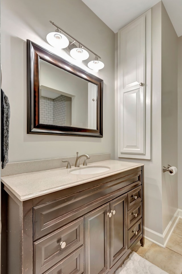 bathroom with vanity and tile patterned flooring