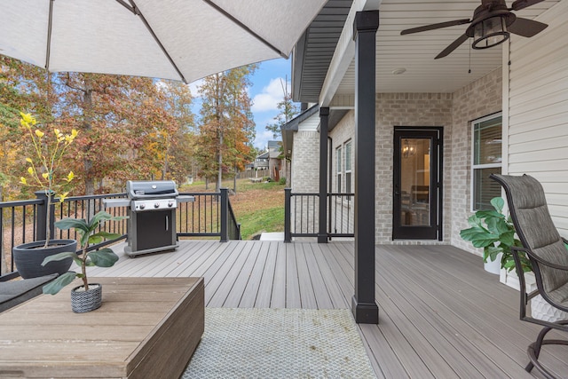 deck featuring ceiling fan and area for grilling