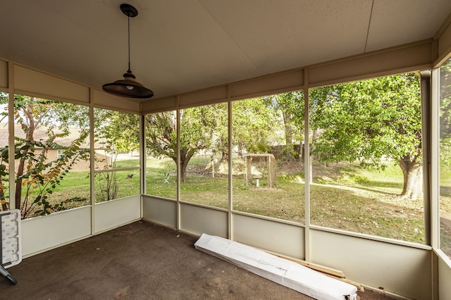 unfurnished sunroom featuring plenty of natural light