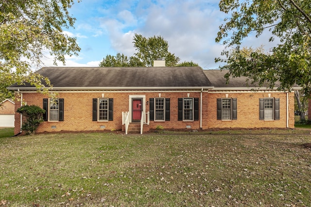 ranch-style home featuring a front yard