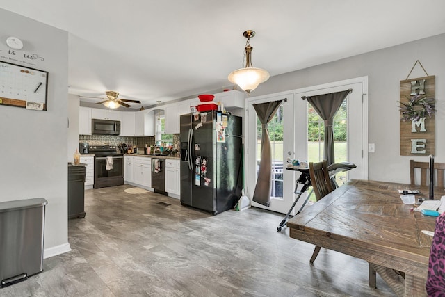 kitchen with backsplash, stainless steel appliances, ceiling fan, decorative light fixtures, and white cabinets