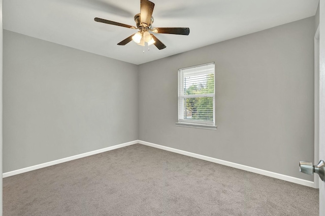 unfurnished room featuring carpet floors and ceiling fan