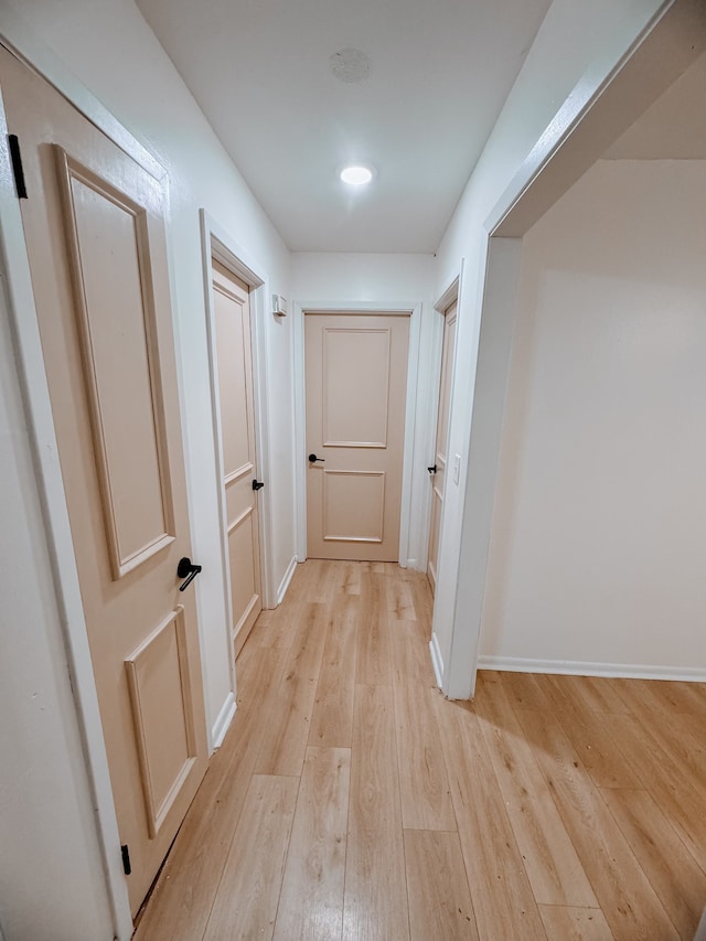 hall featuring light hardwood / wood-style flooring