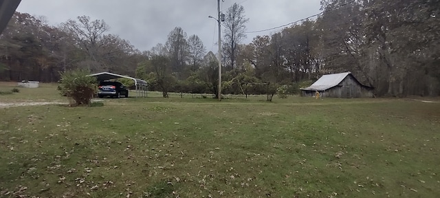 view of yard featuring a carport