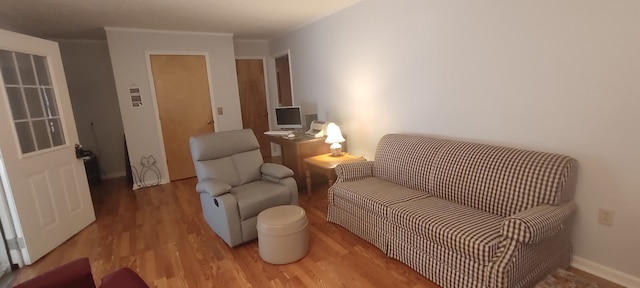 sitting room featuring light hardwood / wood-style floors