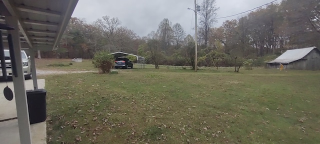 view of yard with a carport