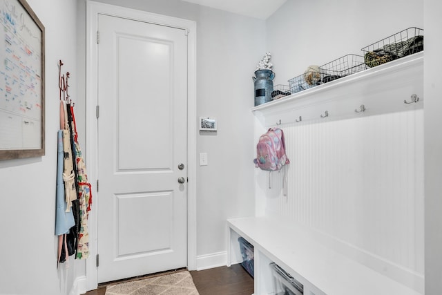 mudroom with dark wood-type flooring