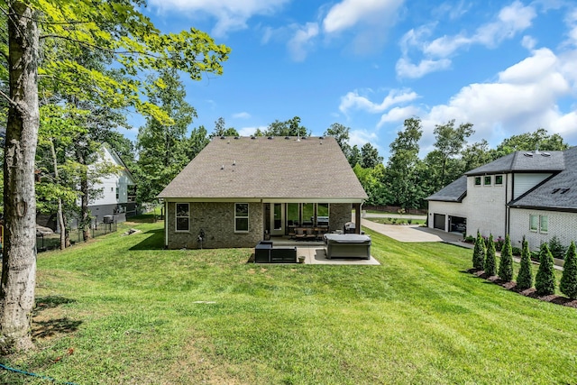 back of property featuring an outdoor living space, a lawn, and a patio area