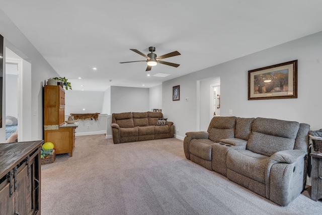 living room featuring ceiling fan and light colored carpet