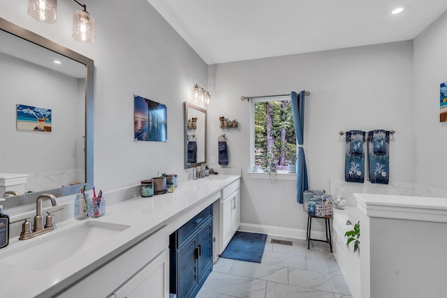 bathroom featuring vanity