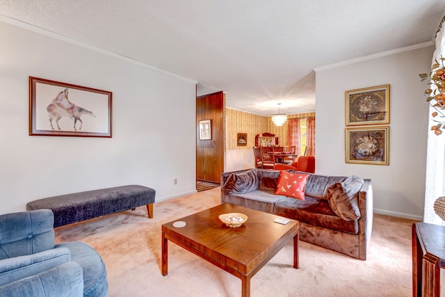 living room featuring ornamental molding, light carpet, a textured ceiling, and baseboards