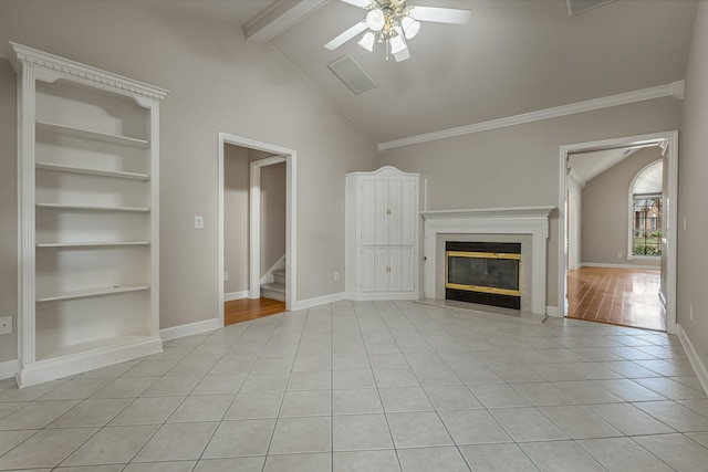 unfurnished living room featuring ceiling fan, light tile patterned floors, vaulted ceiling with beams, and built in shelves