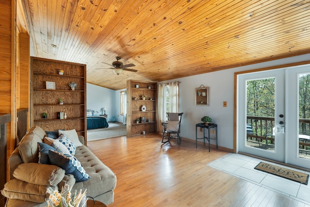 living room featuring ceiling fan, wood ceiling, light hardwood / wood-style flooring, and french doors