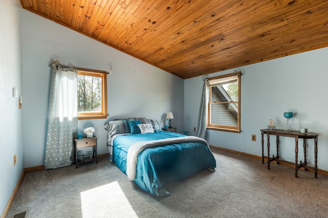 bedroom with multiple windows, wood ceiling, vaulted ceiling, and carpet floors