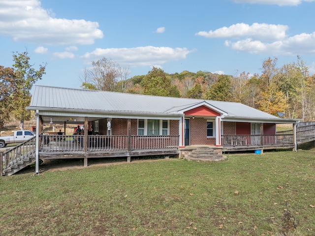 view of front of home featuring a front yard