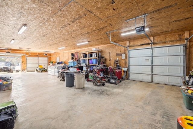 garage featuring a garage door opener