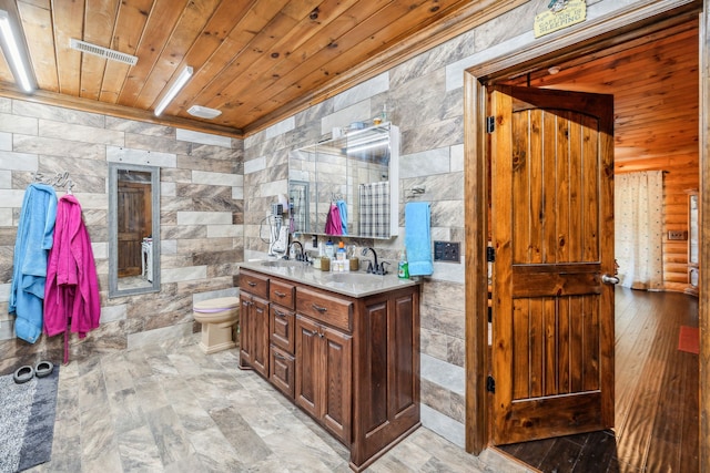 bathroom featuring tile walls, vanity, wood ceiling, hardwood / wood-style flooring, and toilet