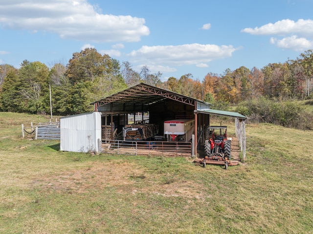 view of outbuilding with a lawn