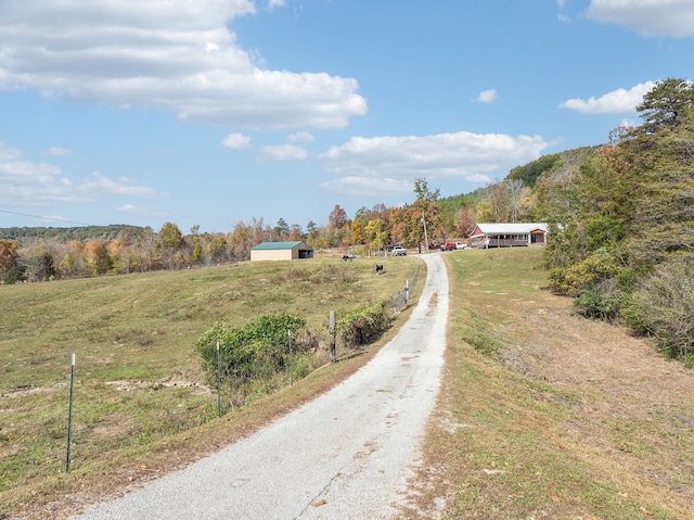 view of road featuring a rural view