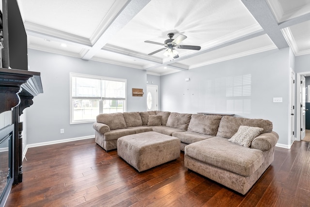 living room with dark hardwood / wood-style flooring, a fireplace, and coffered ceiling