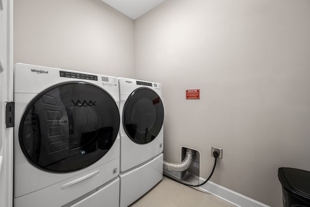 laundry room featuring washing machine and dryer