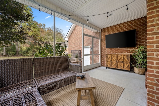 sunroom / solarium featuring plenty of natural light