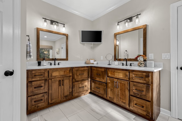 bathroom with vanity and crown molding