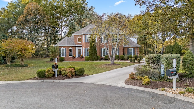 view of front of home with a front lawn