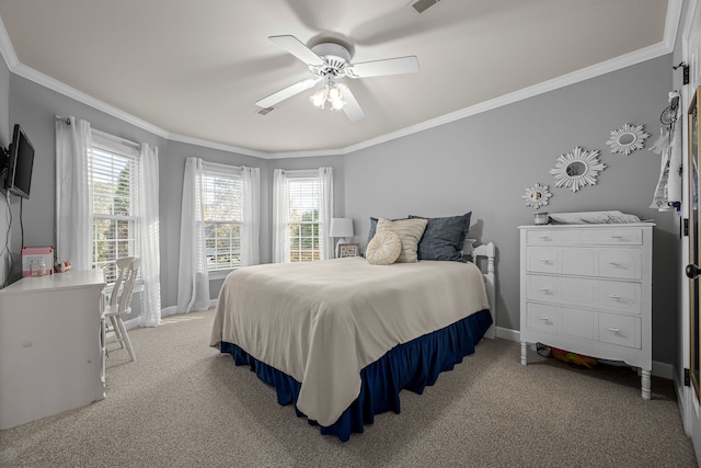 bedroom featuring ornamental molding, light colored carpet, and ceiling fan