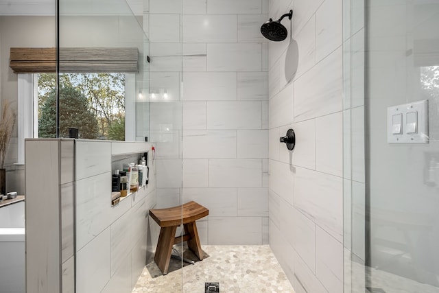 bathroom featuring tiled shower