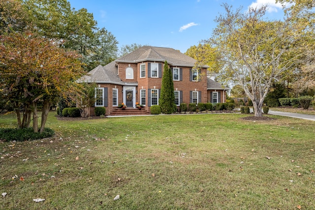 view of front of property with a front lawn