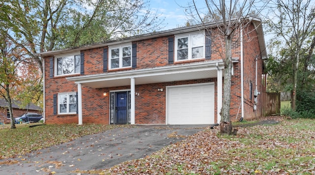 front of property with a garage