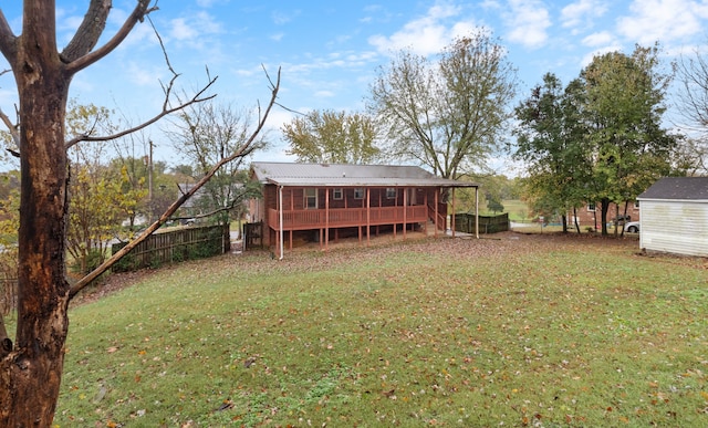 back of property featuring a lawn