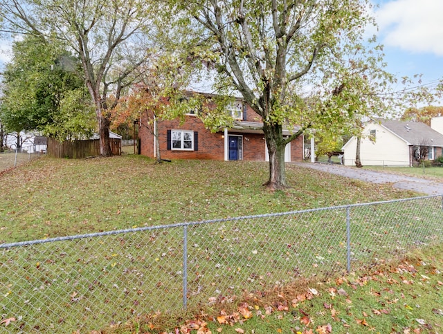 view of front facade with a front lawn