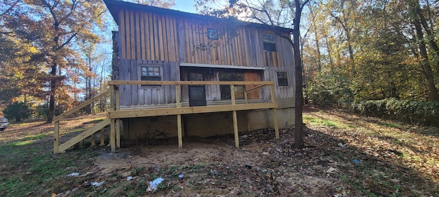 rear view of property with a deck